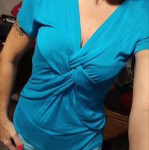 Bright turquoise blouse